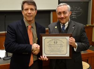 NCDD Dean George Stein confers the NCDD Dean's Award to Justin J. McShane